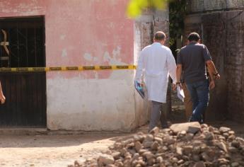 Encuentran semienterrado atrás de su casa, en El Guayabo