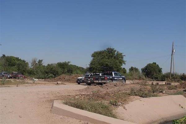 Localizan cadáver flotando en el canal Humaya