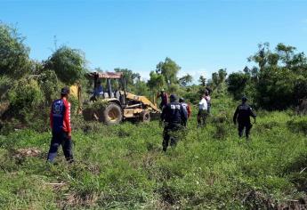 Con maquinaria pesada, buscan a mujeres desaparecidas