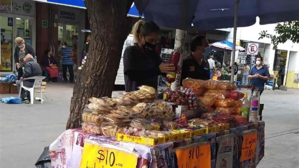 Ambulantes piden cerrar estadios y prohíban fiestas pero que los dejen trabajar