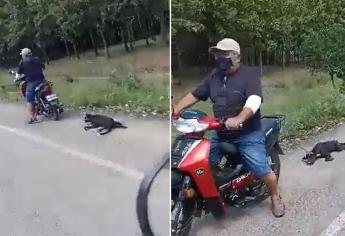 ¡Llevaba a un perrito arrastrando en su motocicleta!