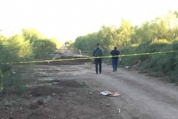 Localizan un cuerpo en descomposición en una fosa en Casa Blanca, Guasave