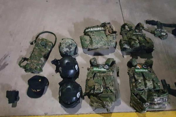 Vinculan a proceso a dos hombres por portación de armas y disparar contra cámaras de seguridad