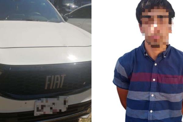 Policías Estatales aseguran a civil con camioneta robada y un fusil de asalto 