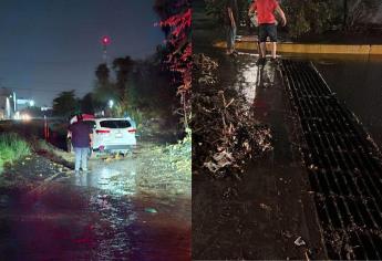 Lluvias de hasta 47 milímetros deja carros varados y casas inundadas en Culiacán